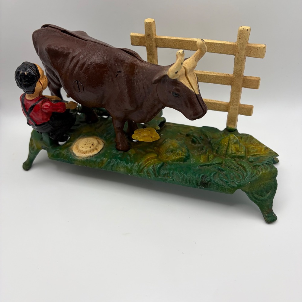 Vintage‎ Reproduction Book of Knowledge Milking Cow Cast Iron Mechanical Bank